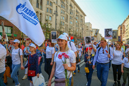 Сотрудники АО «Газпром электрогаз» и ООО «Газпром центрремонт» на шествии «Бессмертного полка» в Москве